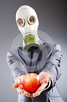 Businessman with gas mask
