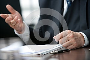 Businessman gesticulating photo