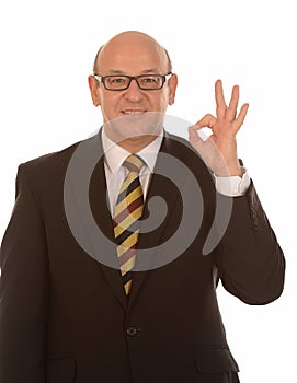 Businessman gesturing OK photo