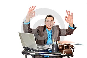 Businessman gesturing okay