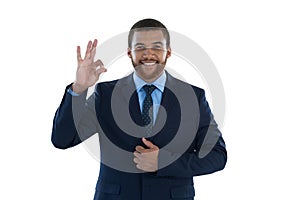 Businessman gesturing okay hand sign