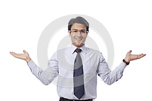 Businessman gesturing and smiling