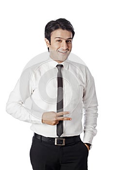 Businessman gesturing and smiling