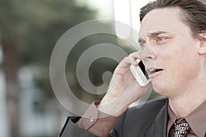 Businessman getting fired over the phone