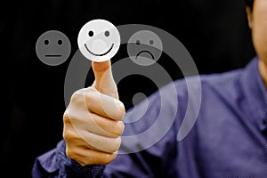 Businessman give rating satisfaction using thumbs up. Evaluate quality of service concept.