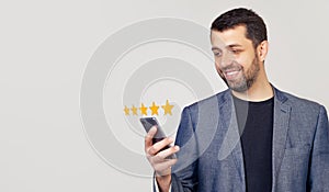 Businessman giving a five star rating. Customer service experience and business satisfaction survey. Businessmusing