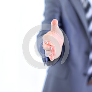 Businessman giving his hand