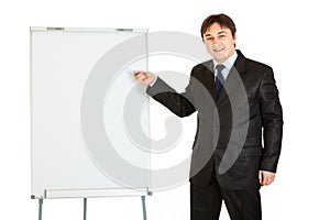 Businessman giving presentation using flipchart