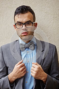 Businessman with glasses and butterfly thinking about something