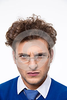 Businessman in glasses looking at camera