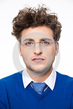 Businessman in glasses loooking at the camera