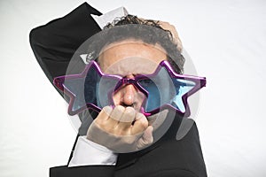 Businessman with glasses stars, crazy and funny achiever