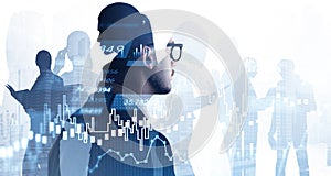 Businessman in glasses and suit looking at financial graphs, candlesticks and silhouettes of colleagues. Analytics for investment