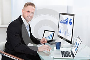 Businessman with good performance graph