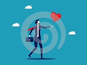 Businessman grabs the floating heart. business love and trust vector