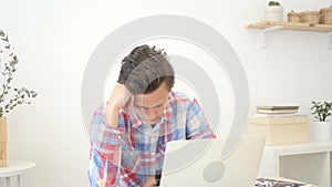 Businessman , Graphic designer yawning and sleeping at his desk in creative