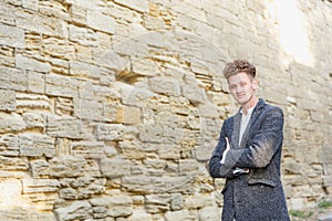 Businessman in gray coat. The concept of career and entrepreneurship.