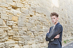 Businessman in gray coat. The concept of career and entrepreneurship.