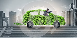 The businessman in green electric car concept