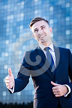 Businessman greeting with somebody photo