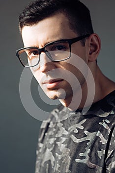 Businessman grooming in optics shop. Man in anti-reflection glasses for visual improvement at oculist. smart fashion