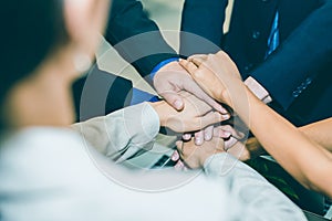 Businessman group of people hand shake after the new project meeting as strength unity teamwork. Business agreement, merger and