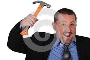 Businessman with a hammer