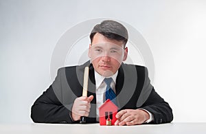 Businessman with hammer