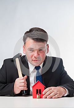 Businessman with hammer