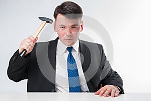 Businessman with hammer