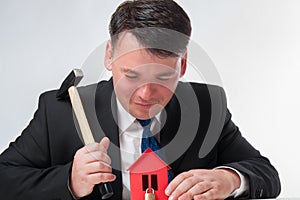 Businessman with hammer