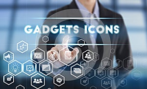 Businessman hand chooses Gadgets icons wording on interface