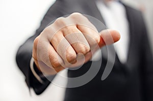 Businessman hand clenched fist - Tough Negotiations and aggressive Negotiator