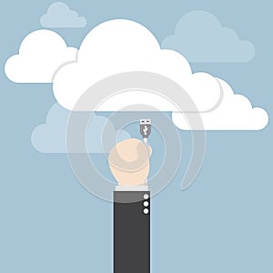 Businessman hand connecting cable to the cloud, Cloud computing