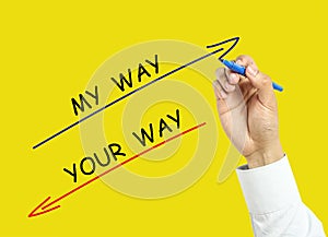 Businessman hand drawing my way and your way concept