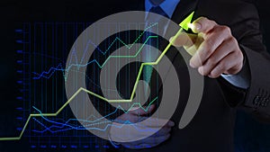 Businessman hand drawing virtual chart business on