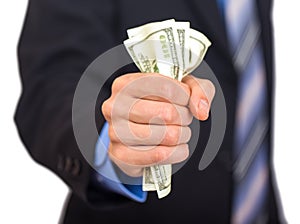 Businessman hand grabbing money