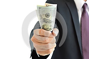 Businessman hand grabbing money, US dollar (USD) bills