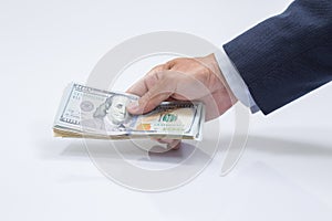 Businessman hand grabbing USD