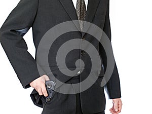Businessman hand hold video gamepad like a gun