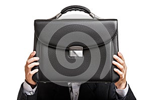 Businessman hand holding briefcase