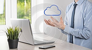 Businessman hand holding cloud.Cloud computing concept, close up of young business man with cloud over his hand.The concept of