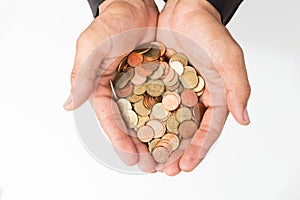 Businessman hand holding the coins, concept of saving  money for finance accounting