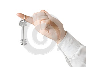 Businessman hand, holding key isolated