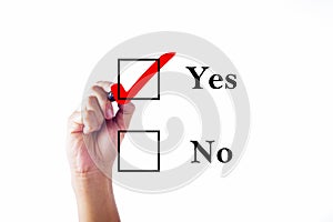 Businessman hand marking in Yes check-box, isolated on white