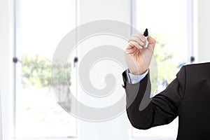 Businessman hand with pen ready to write something