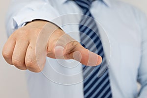 Businessman hand in pointing