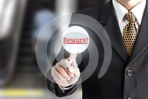 Businessman hand pointing on the screen keypad careful