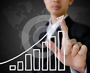 Businessman hand pointing showing graph