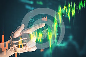 Businessman hand pointing at stock chart screen interface with data